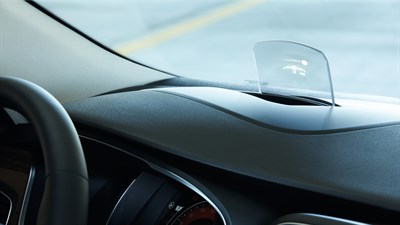 A man driving his Renault car using the R-LINK 2 system