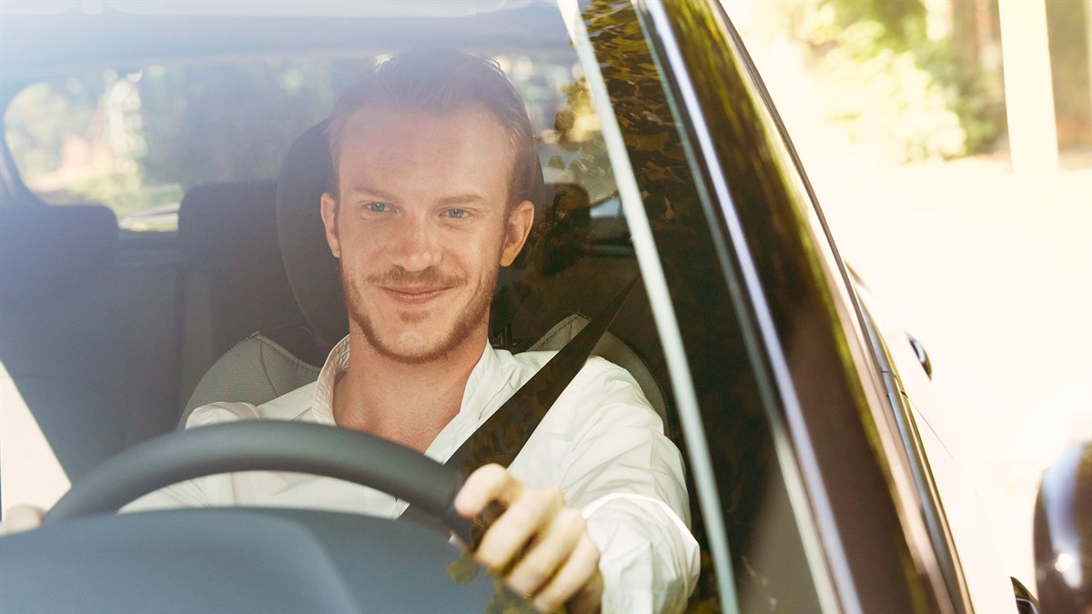 Renault Service - A man driving a car