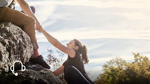 A women climbing rocks
